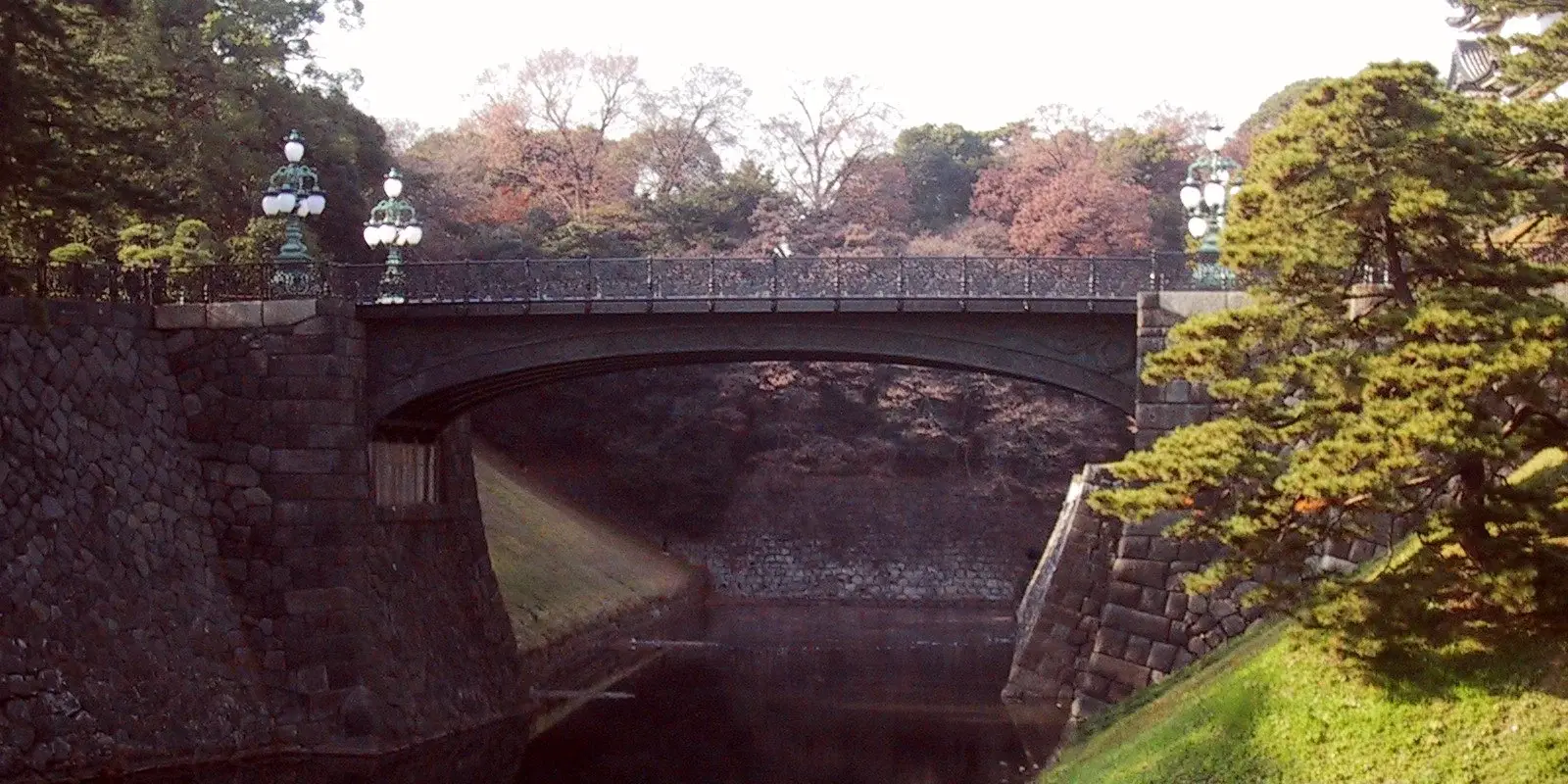 Nijubashi Bridge and the stone walls of the Imperial Palace, seen from the outer plaza across the moat