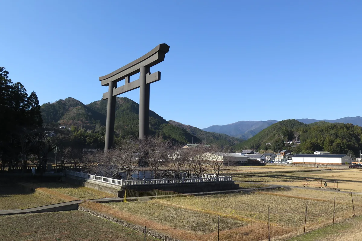 The Oyunohara giant torii gate standing in open fields near Kumano Hongu Taisha