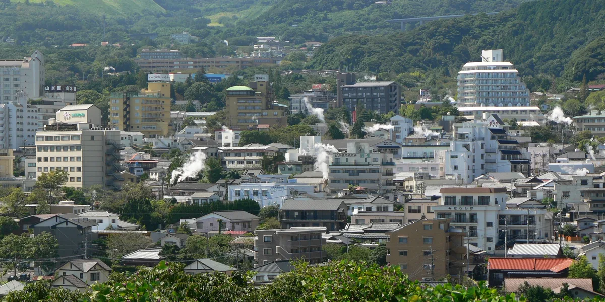 Columns of steam rising over the rooftops of the Kannawa district in Beppu