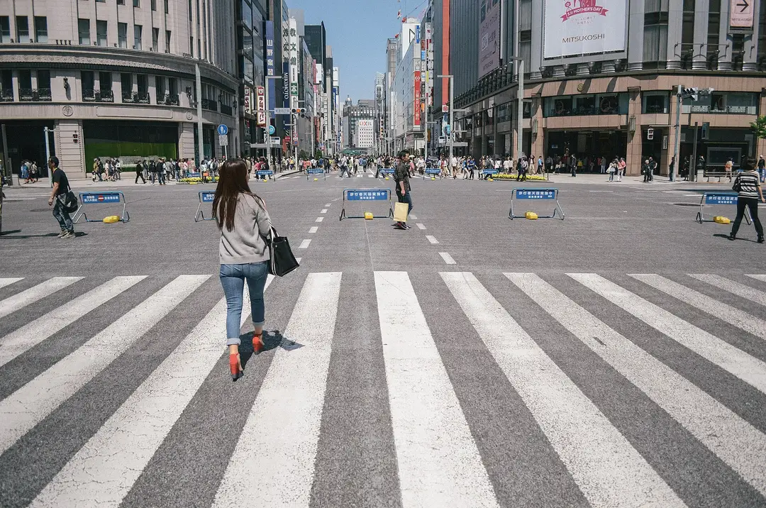 Ginza's Chuo-dori avenue closed to traffic on a weekend afternoon, seen from the 4-chome crossing, Tokyo